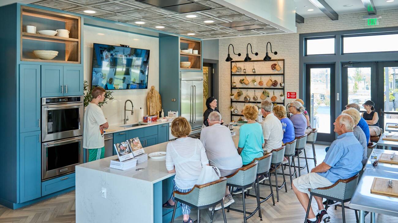 Amblebrook residents participating in a cooking demo class at the Nourish Kitchen.