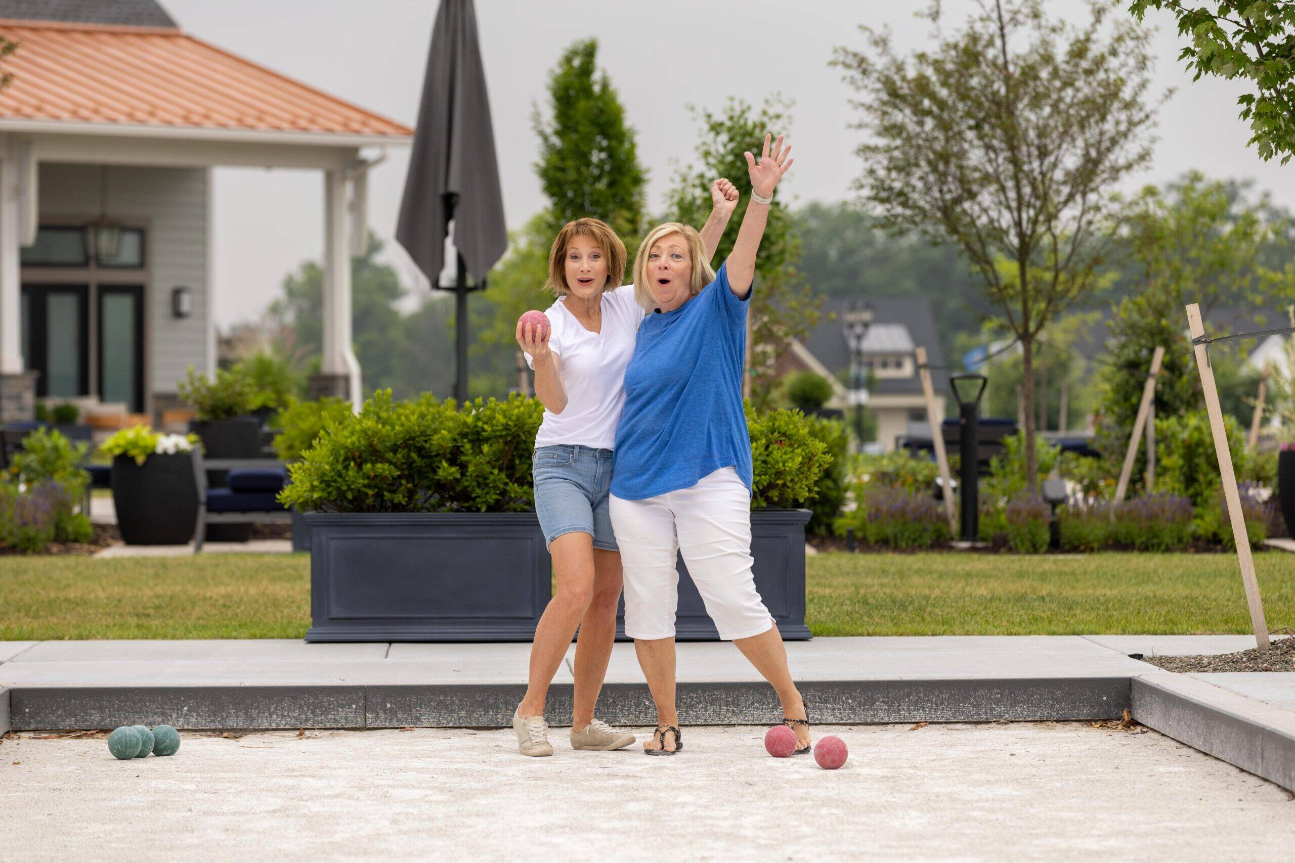 2 active adults celebrating a win!