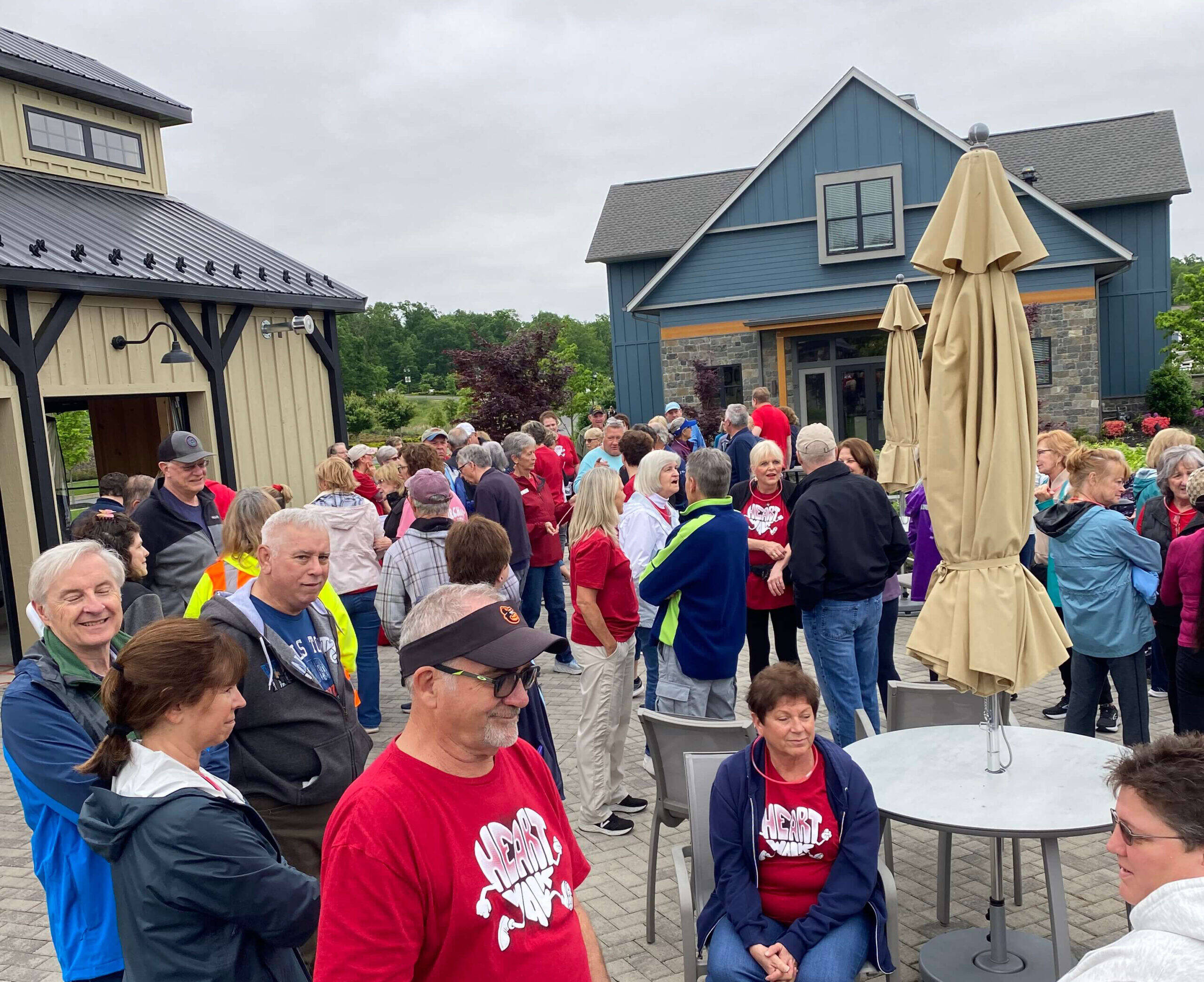 Amblebrook residents chatting on the Great Lawn after Heart Walk event