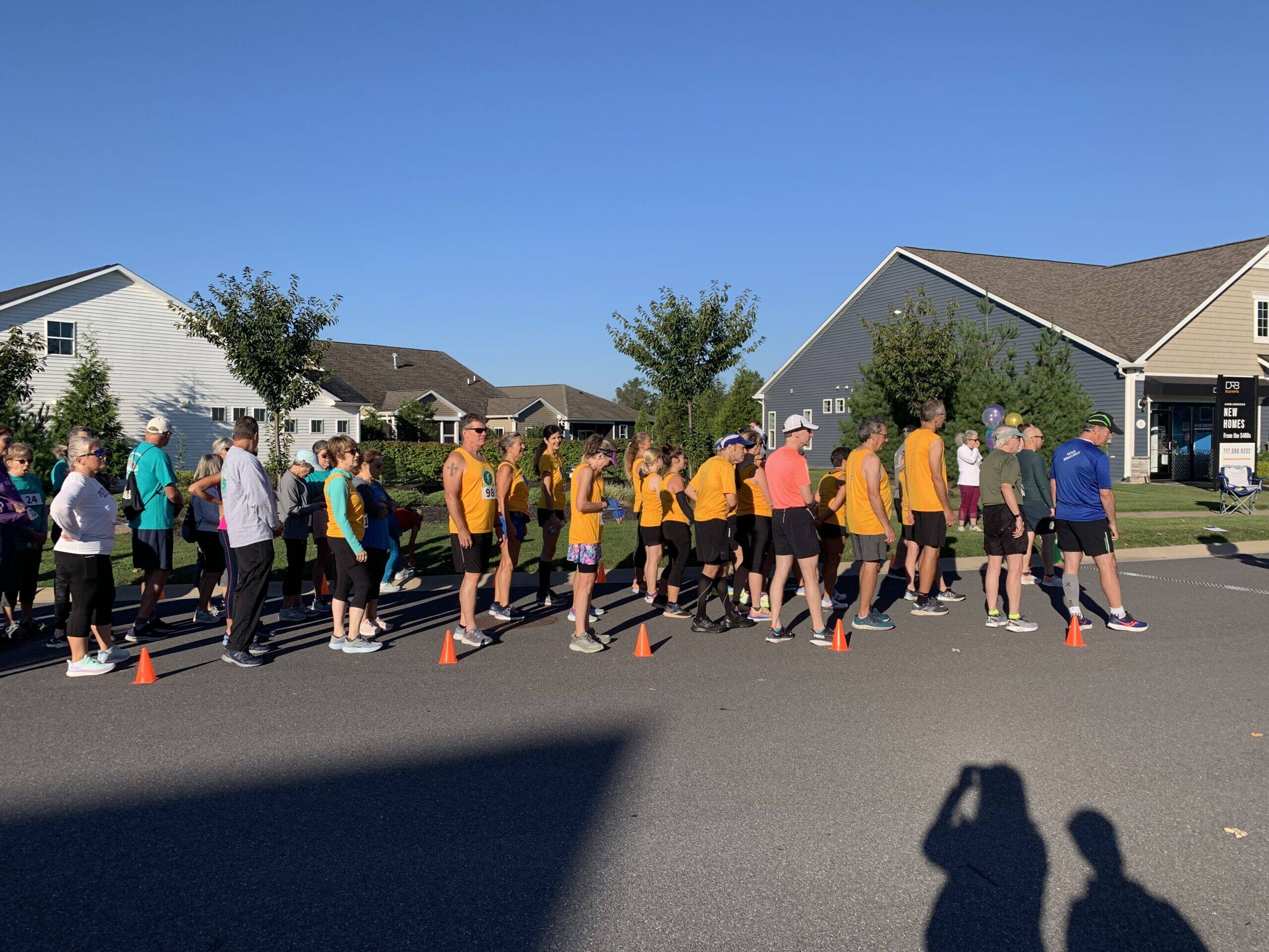 Amblebrook residents participating in a neighborhood 5k race to support local causes.