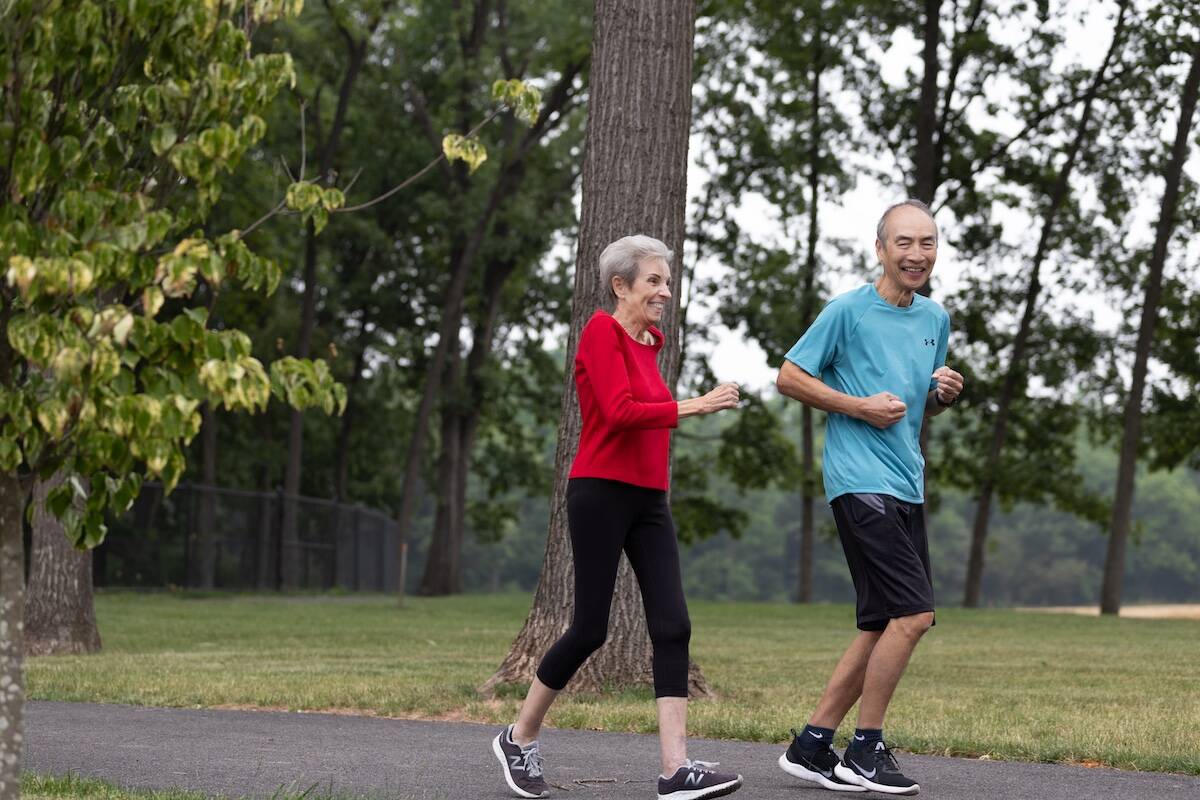 Two Amblebrook at Gettysburg residents on a walk/run in the community.