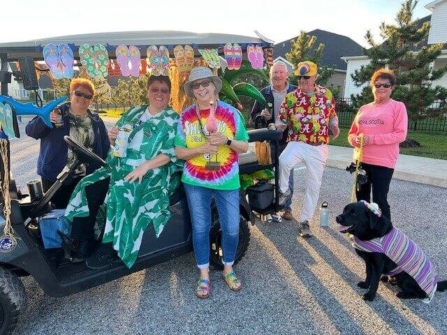 Amblebrook residents decorating golf carts and wearing costumes for Vibrant Living week